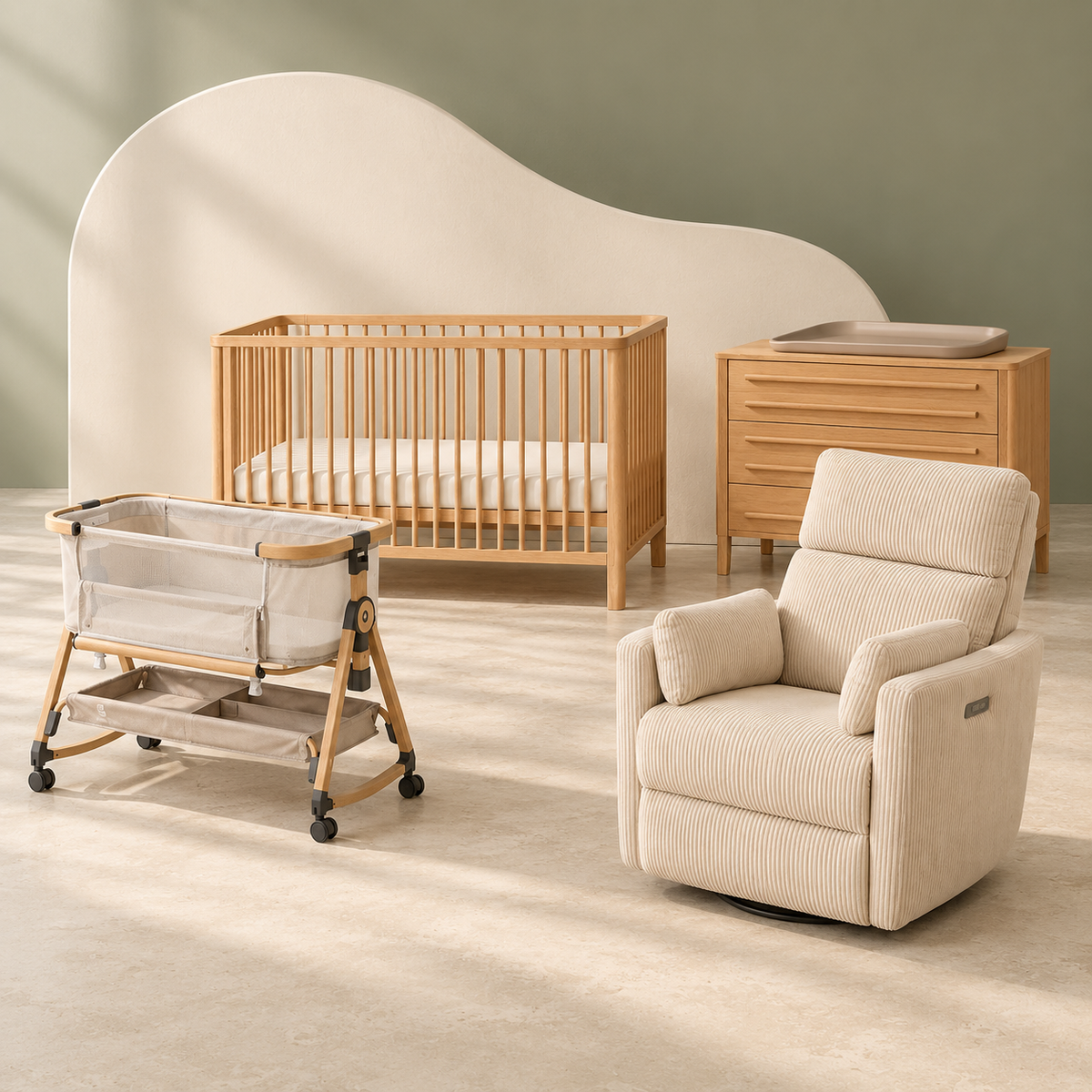 Rever Bebe cot, chest, cream nursery chair and bedside bassinet in a sage studio.