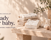 Folded baby clothes, muslins, knitted booties and feeding essentials, with the caption Ready for baby. The essentials, made simple.