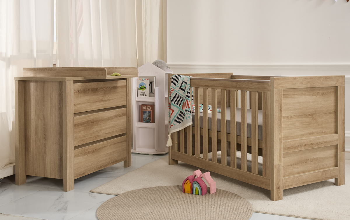 Matching Rever Bebe Classic Ash cot and three-drawer changing chest.