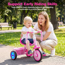 Foldable pink toddler tricycle with lighting wheels and adjustable seat, designed for children ages 2-5 for fun outdoor play.