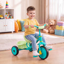 Toddler tricycle in green with a metal frame, ergonomic seat, and detachable rear storage basket for active play.