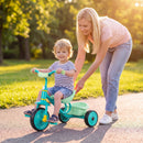 Toddler tricycle in green with a sturdy metal frame, featuring a rear storage basket for toys and snacks, perfect for ages 2-5.