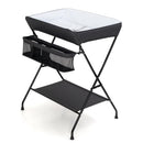 Folding baby change table in black with storage basket and shelf, designed for convenience and comfort during diaper.