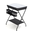 Folding baby change table in black featuring a smooth PVC top surface and a sturdy steel frame for enhanced stability.