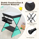 Folding baby change table in black with storage basket and shelf, designed for convenience and stability for parents.