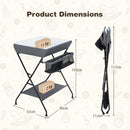 Folding baby change table in grey with storage basket and shelf, designed for convenience and stability for parents.