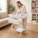 Folding newborn nursery organizer features a 3-compartment storage basket and shelf, ideal for convenient diaper changes.