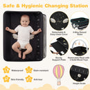 Baby changing table in black with storage bag, removable cover, and adjustable height for safe and convenient diapering.