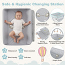 Baby changing table in grey with removable cover, storage bag, and adjustable height for convenient diapering.