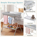 Baby changing table in grey with zippered storage bag, lower shelf, and drying rack for easy access to essentials.