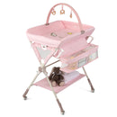 Baby changing table in pink with storage bag and shelf, adjustable height, and secure design for newborns and infants.