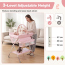 Baby changing table in pink with adjustable height, storage bag, and shelf for easy diapering and care.