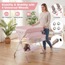 Baby changing table in pink with storage bag and shelf, featuring 4 lockable wheels for easy mobility and safety.