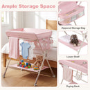 Baby changing table in pink with zippered storage bag, lower shelf, and drying rack for newborn essentials.