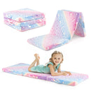 Foldable floor mattress in colorful flannel with glow-in-the-dark feature, perfect for toddler naps and playtime.