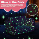 2-in-1 folding kids couch in pink with glow-in-the-dark star patterns, perfect for cozy playtime and naps.