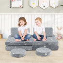 Modular kids play couch set in grey with foldable cushions and glowing star patterns for imaginative play and comfort.
