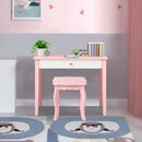 Kids makeup table and stool set in pink with tri-folding mirror, perfect for bedroom use and storing small items.