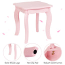 Pink kids' vanity stool with solid wood legs, featuring a non-slip pad and robust construction for stability.