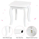 White kids vanity stool with solid wood legs, featuring a non-slip pad for stability and safety in the bedroom.