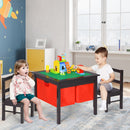 Two children engaged in play at a kids activity table with storage drawers, designed for building and creative learning.