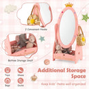 Kids freestanding dressing mirror in pink with 360° rotatable design, bottom shelf, and side hooks for organized.