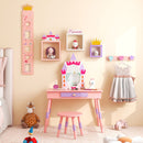Princess makeup dressing table set in pink with castle-shaped mirror, spacious storage, and cute accessories for kids.