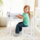 Toddler activity table and chair set in white with paper roll holder, perfect for drawing and studying in kids' room.