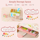 Height-adjustable pink kids desk with tilt desktop, rotatable book stand, and storage drawer for study and play.