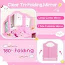 Tri-folding acrylic mirror with 180° adjustable sides on a pink kids vanity table and chair set for versatile use.