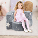 Convertible grey children's sofa chair with glow-in-the-dark star patterns, designed for comfort and play.