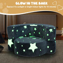 Convertible grey kids sofa chair with glow-in-the-dark star patterns, perfect for reading and playing.