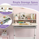 Height-adjustable grey learning desk with open shelves and large drawer, perfect for kids aged 3-12 for organized study.
