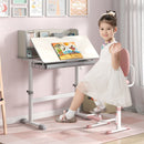 Height-adjustable grey learning desk for kids with storage drawer and tiltable desktop, perfect for homework and art.