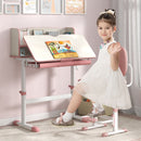 Height-adjustable pink learning desk for kids, featuring a tiltable top, storage drawer, and scale ruler for ages 3-12.