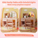 Kids vanity desk in pink with colorful lights and spacious tabletop, perfect for imaginative play and daily routines.