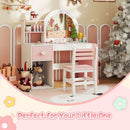 Kids vanity desk in white and pink with colorful lights and shatterproof mirror, perfect for imaginative play and storage.