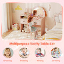 Kids vanity desk with colorful lights and shatterproof mirror, perfect for dress-up and imaginative play in pink.