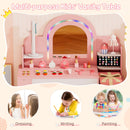 Kids' pink vanity table with LED mirror, jewelry rack, and open shelves for dressing, writing, and painting activities.