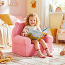 Kids bear sofa in pink with soft fleece fabric, perfect for reading and relaxing in a playroom setting.