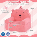Kids bear sofa in pink with teddy fleece cover, high-density foam, and carry handle for playroom relaxation.