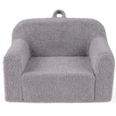 Toddler foam couch in grey with teddy fleece cover, designed for playrooms, featuring a comfy backrest and carry handle.