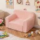 Toddler foam couch in pink with soft teddy fleece cover, perfect for playroom relaxation and comfort for kids.