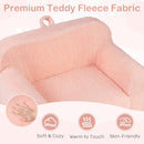 Toddler foam couch in pink with premium teddy fleece fabric, featuring a cozy design and convenient carry handle for.