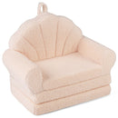 Shell-shaped kids flip out sofa in beige with plush teddy fleece cover, perfect for playroom relaxation and activities.