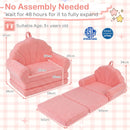 Kids 2-in-1 flip out sofa in pink features a soft teddy fleece cover, shell-shaped backrest, and lightweight portable design.