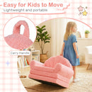 Kids 2-in-1 flip out sofa in pink with teddy fleece cover and carry handle, perfect for playroom relaxation.