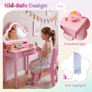 Kids vanity set in pink with cloud mirror, featuring rounded edges and storage, perfect for playtime or homework.