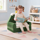 Cozy green 2-in-1 toddler sofa converts to a bed, perfect for reading and playing, designed for ages 18-36 months.