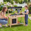 Natural wooden outdoor mud kitchen with accessories